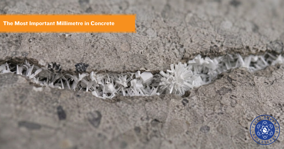 Crystalline growth forming within a concrete crack to support self-healing and concrete durability